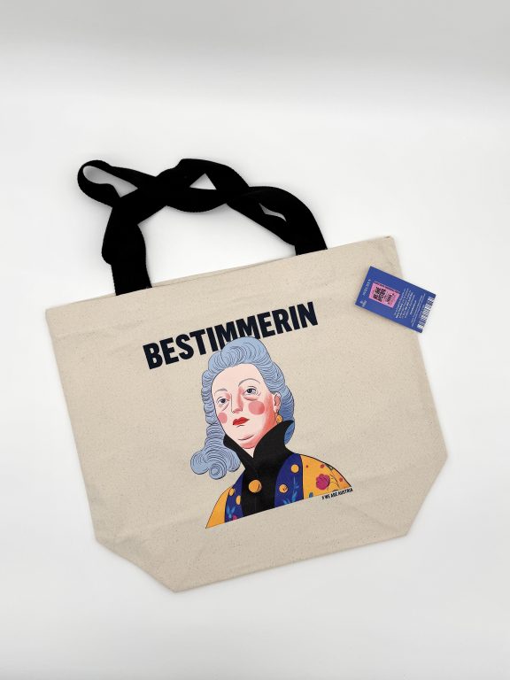 Foto der Stofftasche mit Illustration von Maria Theresia und der Überschrift Bestimmerin